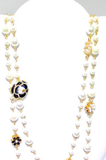 Double Strand Pearl Necklace With Gold Floral Accents Double Strand Pearl Necklace With Gold Floral Accents