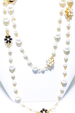 Double Strand Pearl Necklace With Gold Floral Accents Double Strand Pearl Necklace With Gold Floral Accents