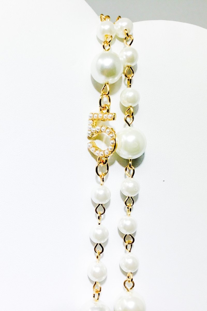 Double Strand Pearl Necklace With Gold Floral Accents